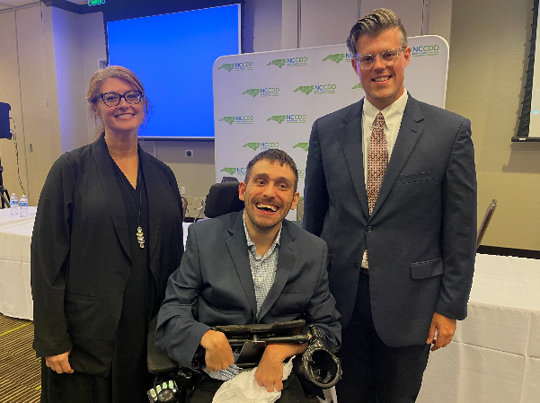 Image of NCCDD's director, chairperson and secretary